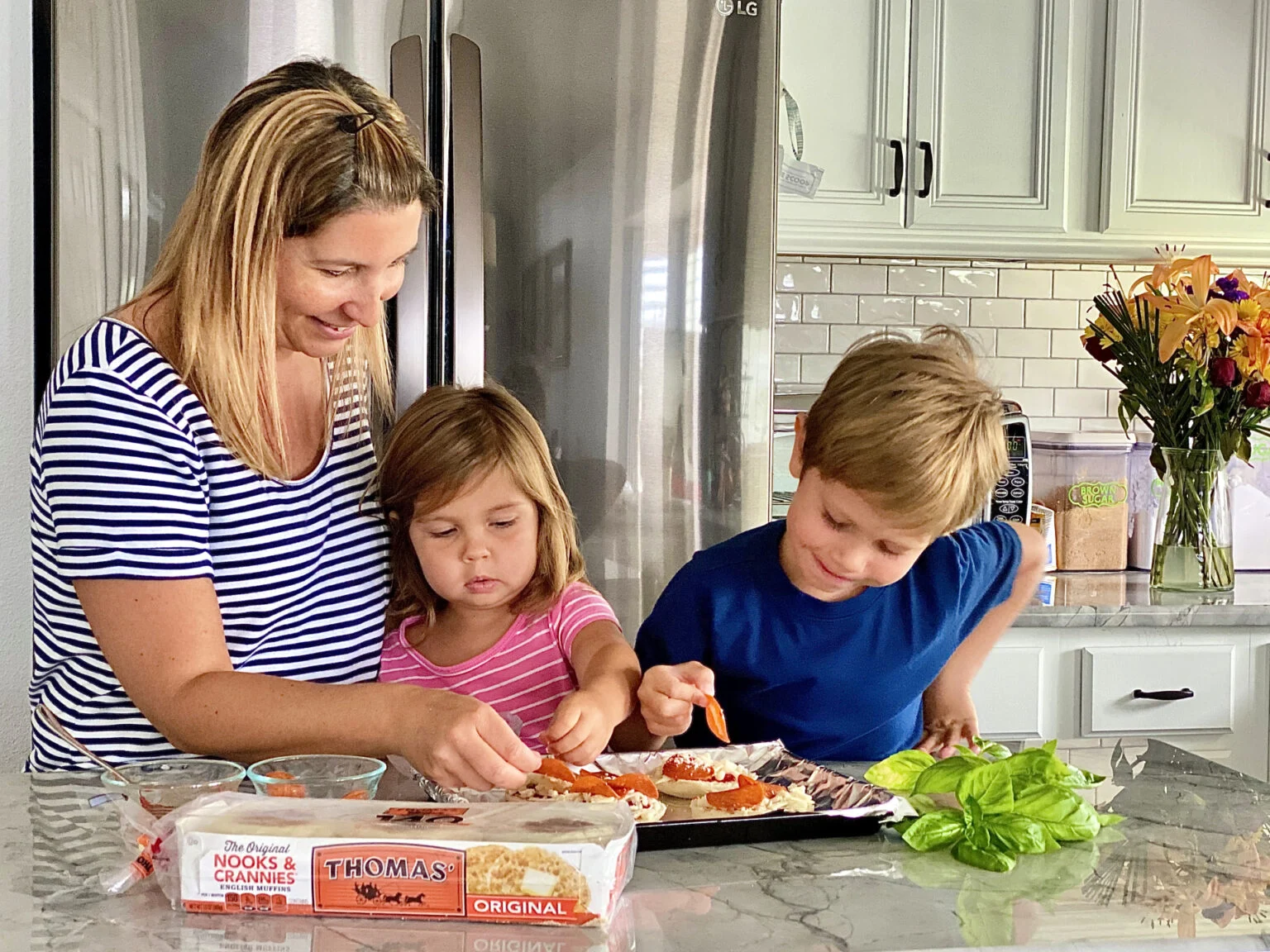 Family-making-Toaster-Oven-English-Muffin-Pizzas-1536x1152